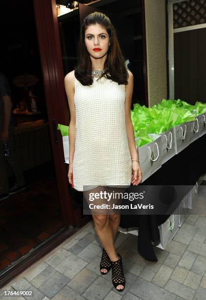 Actress Alexandra Daddario poses in the green room at the 2013 Teen Choice Awards at Gibson Amphitheatre on August 11, 2013 in Universal City,...