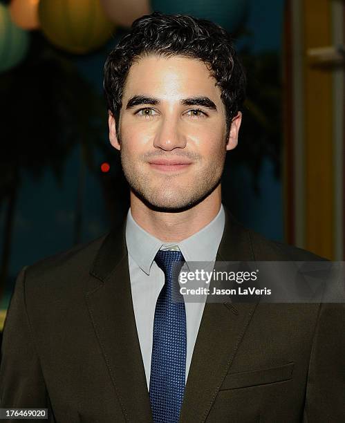 Actor Darren Criss poses in the green room at the 2013 Teen Choice Awards at Gibson Amphitheatre on August 11, 2013 in Universal City, California.