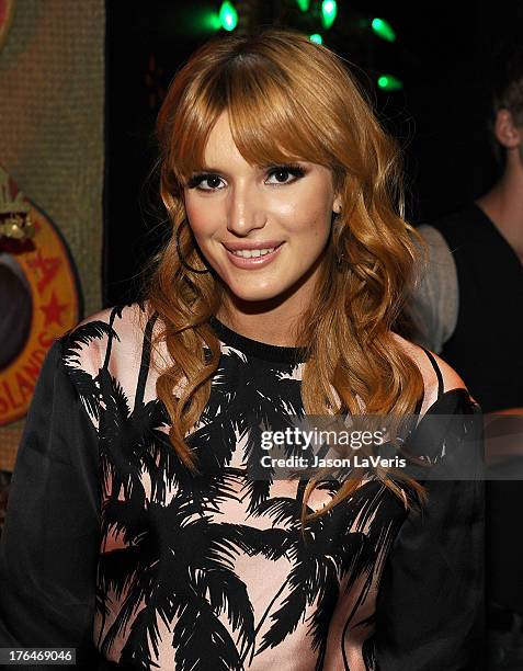 Actress Bella Thorne poses in the green room at the 2013 Teen Choice Awards at Gibson Amphitheatre on August 11, 2013 in Universal City, California.