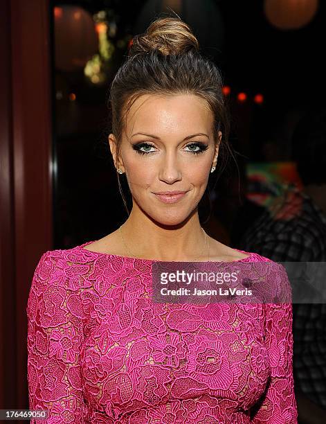 Actress Katie Cassidy poses in the green room at the 2013 Teen Choice Awards at Gibson Amphitheatre on August 11, 2013 in Universal City, California.