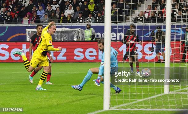 Julian Brandt of Borussia Dortmund scores his teams third goal during the Bundesliga match between Eintracht Frankfurt and Borussia Dortmund at...