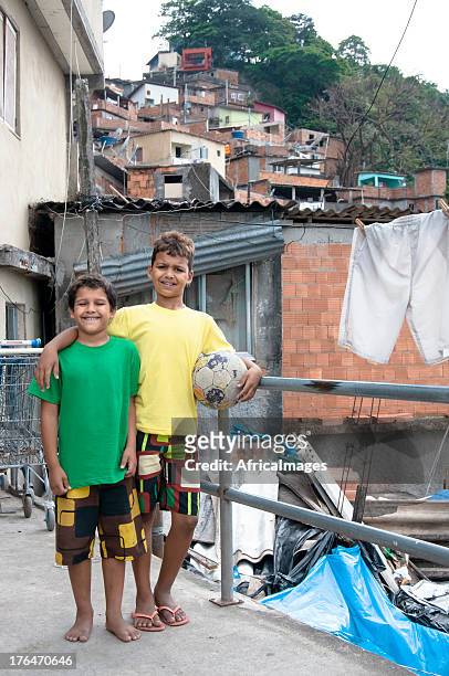 football team mates in a brazilian slum, rio de janeiro - the project portraits stock pictures, royalty-free photos & images