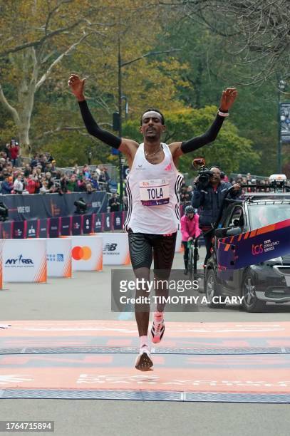 Ethiopia's Tamirat Tola celebrates winning the 52nd Edition of the New York City Marathon on November 5, 2023. / ALTERNATE CROP