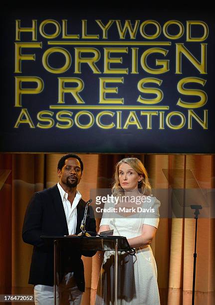 Actors Blair Underwood and Julie Delpy speak onstage at the Hollywood Foreign Press Association's 2013 Installation Luncheon at The Beverly Hilton...