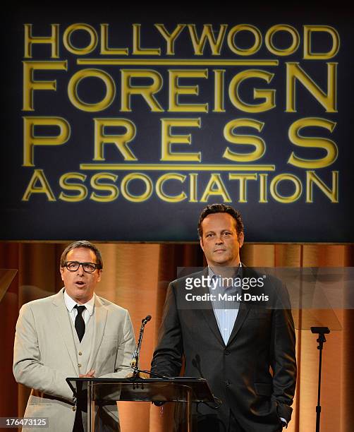 Director David O. Russell and actor Vince Vaughn speak onstage at the Hollywood Foreign Press Association's 2013 Installation Luncheon at The Beverly...