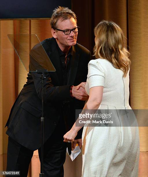 President Theo Kingma and actress Julie Delpy speak onstage at the Hollywood Foreign Press Association's 2013 Installation Luncheon at The Beverly...