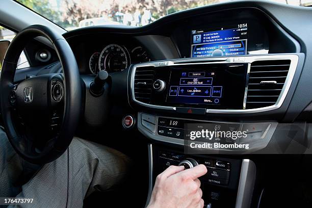 The Pandora Media Inc. Integrated entertainment system is demonstrated inside a Honda Accord vehicle at American Honda Motor Co. Inc. Headquarters in...