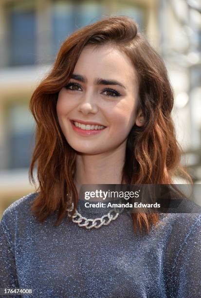 Actress Lily Collins attends "The Mortal Instruments: City Of Bones" meet and greet at The Americana at Brand on August 13, 2013 in Glendale,...