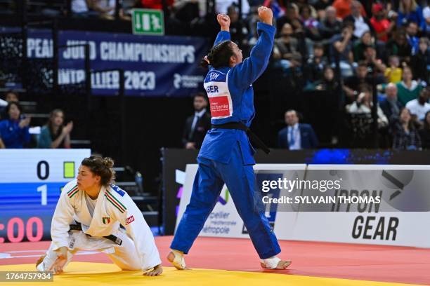 Germany's Alina Boehm celebrates after defeating Italy's Alice Bellandi in the women's -78 kg final during the European Judo Championships 2023 at...
