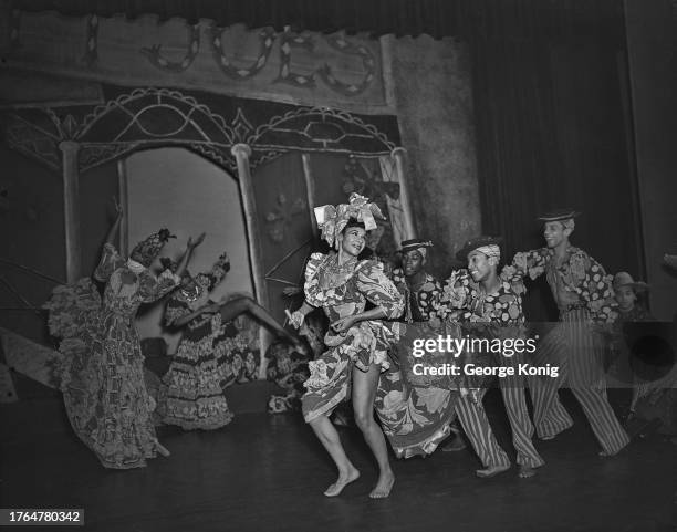 Choreographer Katherine Dunham and her dance company performing 'A Caribbean Rhapsody' at the Prince of Wales Theatre in London, June 1948.