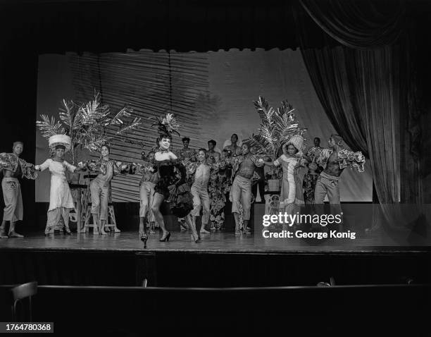 Choreographer Katherine Dunham and her dance company performing 'A Caribbean Rhapsody' at the Prince of Wales Theatre in London, June 1948.