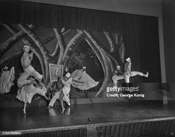 Costumed dancers during a performance of Katherine Dunham's 'A Caribbean Rhapsody' at the Prince of Wales Theatre in London, June 1948.