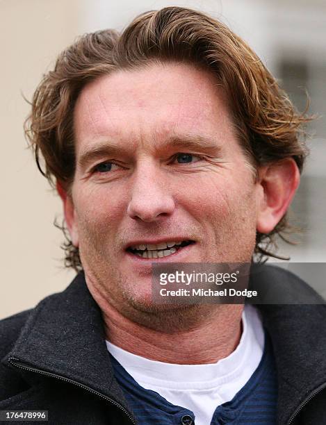 Essendon Bombers coach James Hird speaks to the media at his Toorak home on August 14, 2013 in Melbourne, Australia. The AFL last night announced...