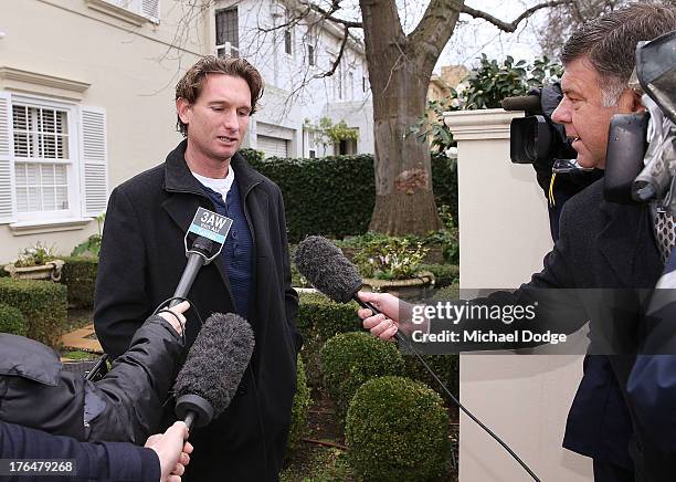 Essendon Bombers coach James Hird speaks to the media at his home in Toorak on August 14, 2013 in Melbourne, Australia. The AFL last night announced...