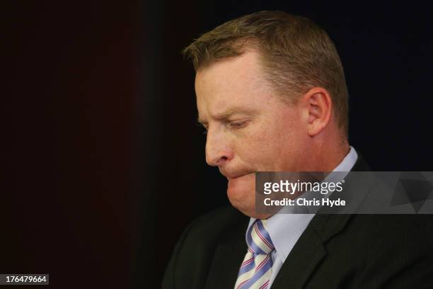 Former Lions coach Michael Voss looks on during a Brisbane Lions AFL media conference at The Gabba on August 14, 2013 in Brisbane, Australia. The...