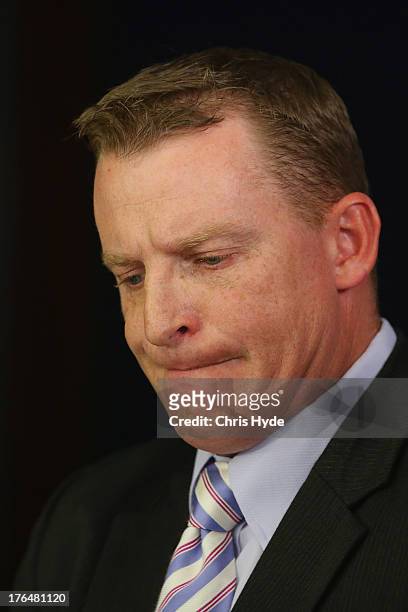 Former Lions coach Michael Voss looks on during a Brisbane Lions AFL media conference at The Gabba on August 14, 2013 in Brisbane, Australia. The...