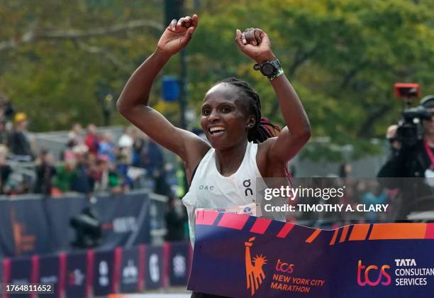 Kenya's Hellen Obiri celebrates winning the 52nd Edition of the New York City Marathon on November 5, 2023.