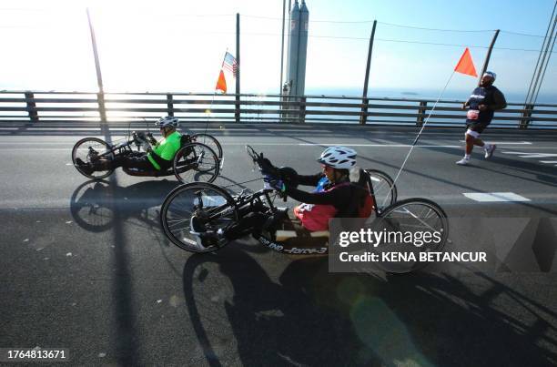 Wheelchair racers cross the Verrazzano-Narrows Bridge ahead of the 52nd Edition of the New York City Marathon on November 5, 2023.