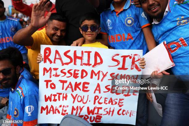 Spectators react in the crowd during the ICC Men's Cricket World Cup India 2023 between Afghanistan and Sri Lanka at MCA International Stadium on...