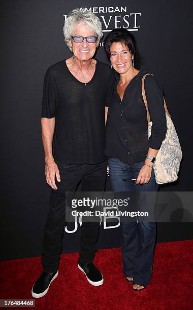 Recording artist Kevin Cronin and wife Lisa Marie Wells attend a screening of Open Road Films and Five Star Feature Films' "Jobs" at Regal Cinemas...
