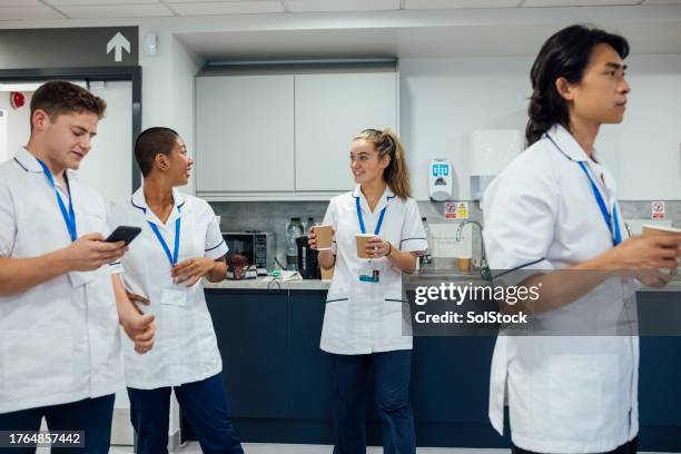 nurses taking their break - general hospital stock pictures, royalty-free photos & images