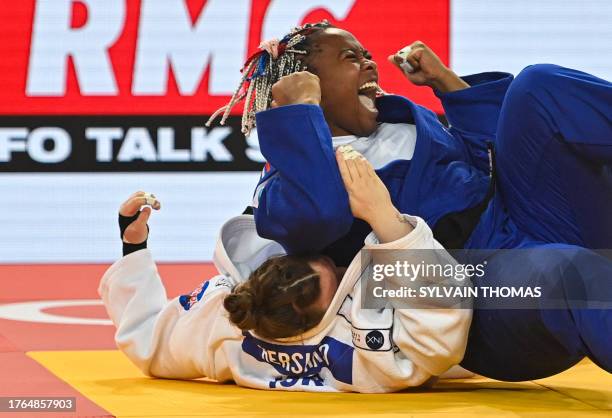 France's Romane Dicko celebrates after defeating Israel's Raz Hershko in the women's +78 kg final during the European Judo Championships 2023 at the...