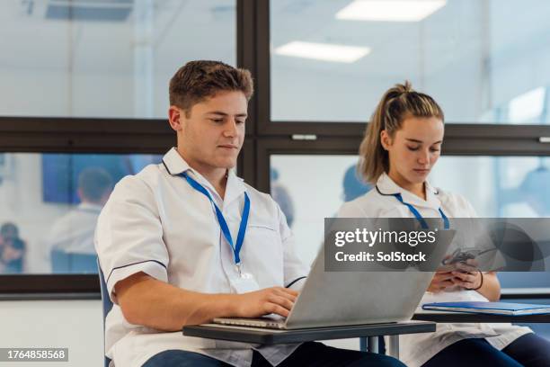 the future of healthcare - classroom laptop stock pictures, royalty-free photos & images