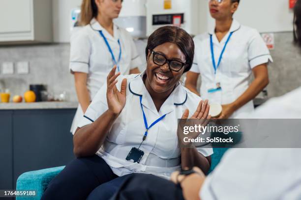 happy student nurse - nhs workers clap stock pictures, royalty-free photos & images