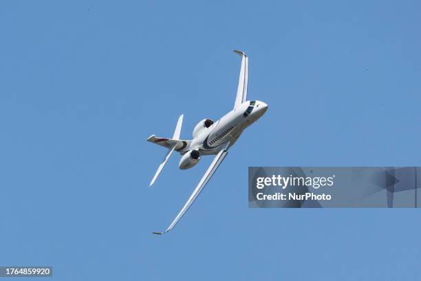 Dassault Falcon 6X aircraft seen taking off and flying during a flight demonstration at International Paris Air Show 2023 in Le Bourget Airport. The...