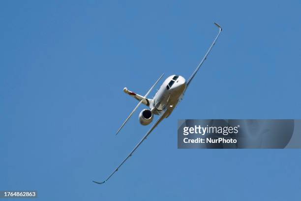 Dassault Falcon 6X aircraft seen taking off and flying during a flight demonstration at International Paris Air Show 2023 in Le Bourget Airport. The...