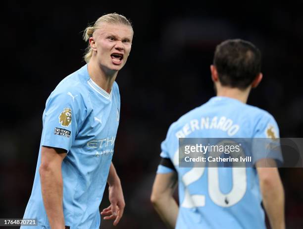 Erling Haaland of Manchester City celebrates after scoring the second goal with Bernardo Silva during the Premier League match between Manchester...