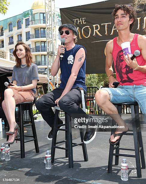 Actors Lily Collins, Jamie Campbell Bower, and Robert Sheehan attend Screen Gems & Constantin Films' 'The Mortal Instruments: City Of Bones' meet and...