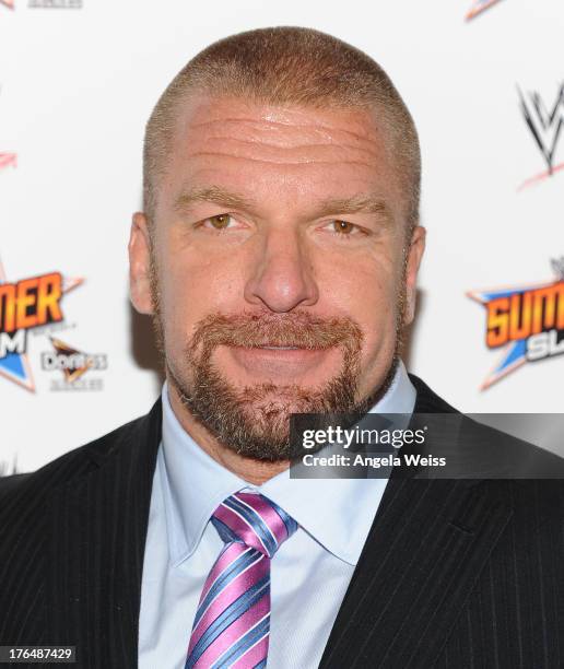 Executive Vice President of Talent and Live Events Paul 'Triple H' Levesque attends the WWE SummerSlam press conference at Beverly Hills Hotel on...