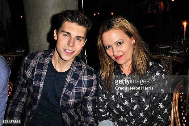 Actor Nolan Gerard Funk and Caroline Rothwell attends Timberland History, Heritage and Fall 2013 Collection Dinner at Chateau Marmont on August 13,...