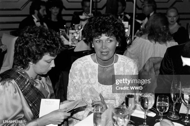 Guests attend the opening of the latest Regine's nightclub, in the penthouse of the Grand Bay Hotel in Miami, Florida, on December 12, 1983.