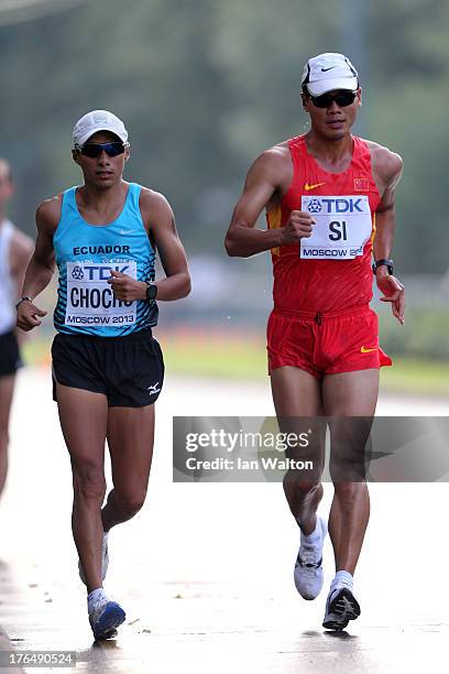 Andres Chocho of Ecuador and Tianfeng Si of China compete in the Men's 50km Race Walk final during Day Five of the 14th IAAF World Athletics...