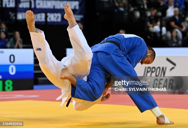 Finland's Martti Puumalainen and Georgia's Guram Tushishvili compete in the men's +100 kg final during the European Judo Championships 2023 at the...