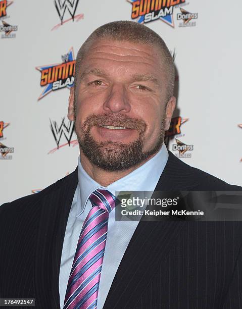 Paul "Triple H" Levesque arrives to the WWE SummerSlam Press Conference at Beverly Hills Hotel on August 13, 2013 in Beverly Hills, California.