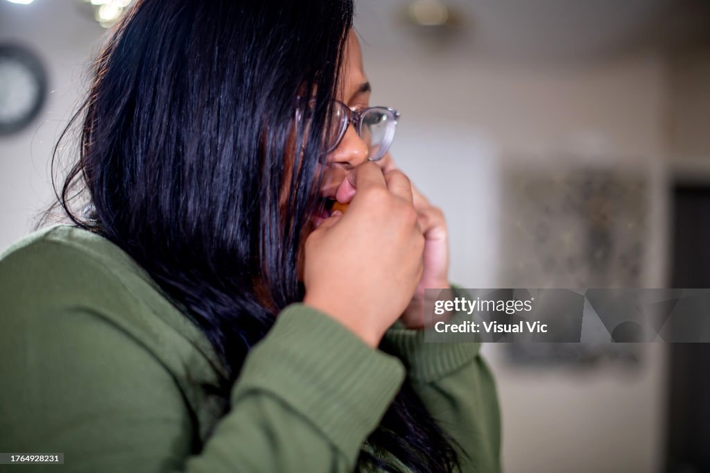 Taking the Throat Balm Talking on the phone