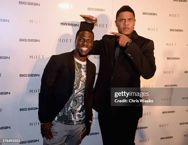 Actors Kevin Hart and Pooch Hall attend Moet Rose Lounge Los Angeles hosted by Big Sean at The London West Hollywood on August 13, 2013 in West...