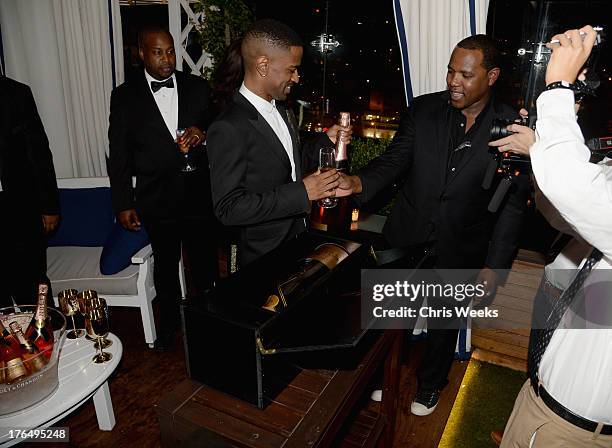 Recording artist Big Sean and KP attend Moet Rose Lounge Los Angeles hosted by Big Sean at The London West Hollywood on August 13, 2013 in West...