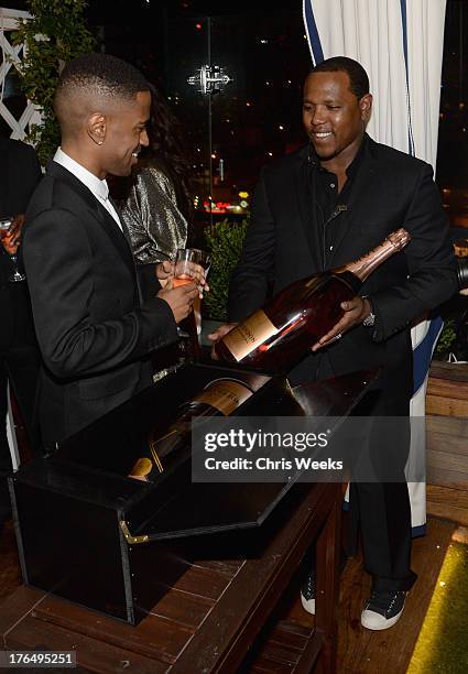 Recording artist Big Sean and KP attend Moet Rose Lounge Los Angeles hosted by Big Sean at The London West Hollywood on August 13, 2013 in West...