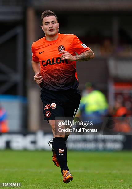 Paul Paton of Dundee United in action during the Scottish Premier League match between Dundee United and Inverness Caledonian Thistle at Tannadice...