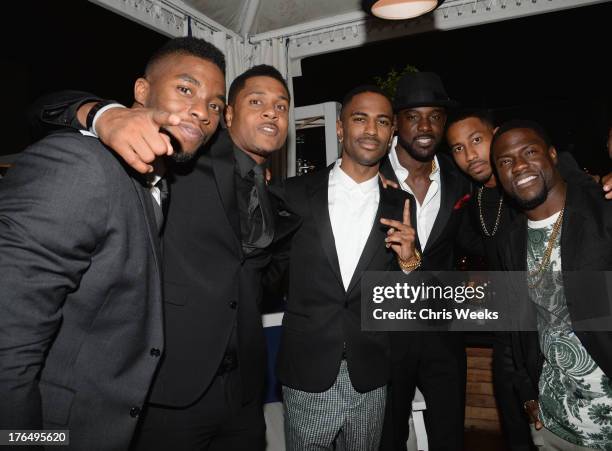 Actor Pooch Hall, recording artist Big Sean, actor Lance Gross and actor Kevin Hart attend Moet Rose Lounge Los Angeles hosted by Big Sean at The...