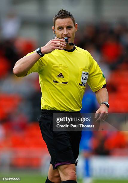 Referee Steven McLean in action during the Scottish Premier League match between Dundee United and Inverness Caledonian Thistle at Tannadice Park on...