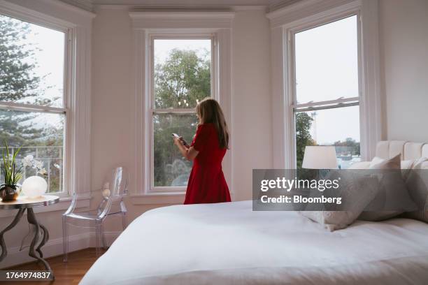 Realtor waits for prospective buyers during an open house at a home in San Francisco, California, US, on Saturday, Nov. 4, 2023. Mortgage rates in...