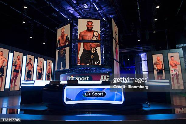 Boxers are displayed on screens surrounding a BT Sport studio at the BT Vision television headquarters in the Olympic Park in London, U.K., on...