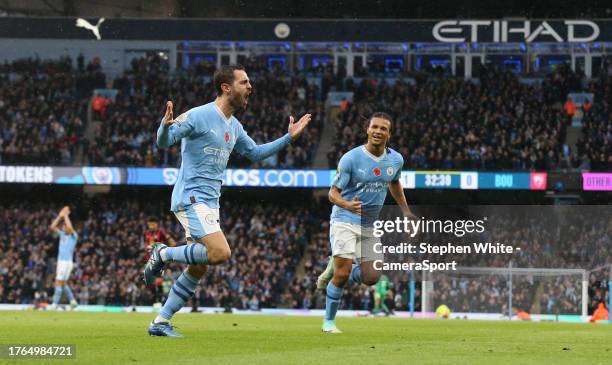 Manchester City's Bernardo Silva celebrates scoring his side's second goal during the Premier League match between Manchester City and AFC...