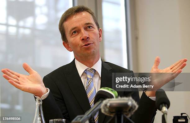 Bernd Lucke, main candidate and co-founder of the euro-critical party Alternative for Germany , speaks to foreign journalists on August 14, 2013 in...