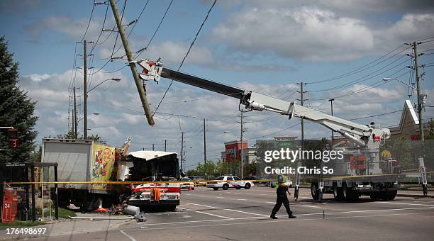 Police close the intersection of Middlefield Road and Steeles Avenue in Scarborough to investigate a crash fatality after a cube truck delivery van...